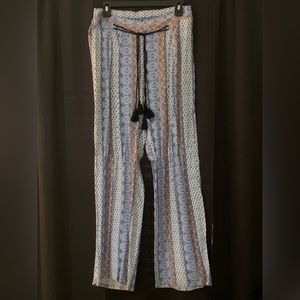 Tied, straight leg, beach pants. Tassel for the waistband.